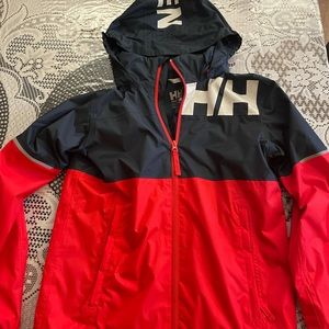 Helly Hansen youth rain jacket. Size 164/14